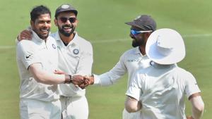 Hyderabad: Indian bowler Umesh Yadav (L) being greeted by teammates after he dismissed West Indies batsman Roston Chase on the second day of the second cricket test match(PTI) Hyderabad: Indian bowler Umesh Yadav (L) being greeted by teammates after he dismissed West Indies batsman Roston Chase on the second day of the second cricket test match(PTI)