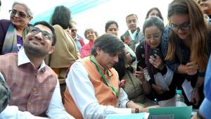 Author and Congress MP Shashi Tharoor signing books on the second day of the Khushwant Singh Literature Festival in Kasauli on Saturday.(Ravi Kumar/HT) Author and Congress MP Shashi Tharoor signing books on the second day of the Khushwant Singh Literature Festival in Kasauli on Saturday.(Ravi Kumar/HT)