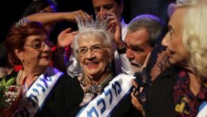 Holocaust survivor Tova Ringer, 93, reacts after winning the annual Holocaust survivors' beauty pageant in Haifa, Israel on October 14.(REUTERS) Holocaust survivor Tova Ringer, 93, reacts after winning the annual Holocaust survivors' beauty pageant in Haifa, Israel on October 14.(REUTERS)