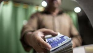 A whopping Rs 460 crore worth of transactions were made through three bank accounts of a man who died months before these fake accounts were mysteriously opened under his name, a media report said Monday.(Representative Image/Bloomberg Photo) A whopping Rs 460 crore worth of transactions were made through three bank accounts of a man who died months before these fake accounts were mysteriously opened under his name, a media report said Monday.(Representative Image/Bloomberg Photo)