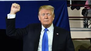US President Donald Trump arrives to a US President Donald Trump arrives to a
