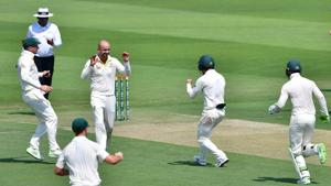 Nathan Lyon (second from left) celebrates after dismissing a Pakistan batsman at the Abu Dhabi Cricket Stadium.(AFP) Nathan Lyon (second from left) celebrates after dismissing a Pakistan batsman at the Abu Dhabi Cricket Stadium.(AFP)