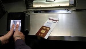 A man has his fingerprints electronically taken while taking part in a visa application demonstration at the consular section of the Embassy of the United States in Lima.(Reuters) A man has his fingerprints electronically taken while taking part in a visa application demonstration at the consular section of the Embassy of the United States in Lima.(Reuters)