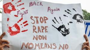 Activists display placards to demand the speedy justice to the 11-year old deaf girl who was allegedly raped in Chennai for 7th months(PTI) Activists display placards to demand the speedy justice to the 11-year old deaf girl who was allegedly raped in Chennai for 7th months(PTI)
