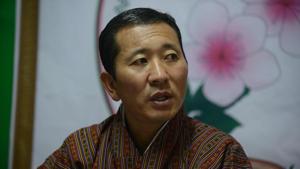 Dr Lotay Tshering, president of Bhutan party Druk Nyamrup Tshogpa (DNT), talks with the media after winning the elections.(AFP) Dr Lotay Tshering, president of Bhutan party Druk Nyamrup Tshogpa (DNT), talks with the media after winning the elections.(AFP)