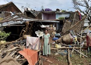 A woman stands near her damaged house hit by cyclone 'Titli'.(PTI FILE PHOTO) A woman stands near her damaged house hit by cyclone 'Titli'.(PTI FILE PHOTO)