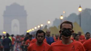 A runner wearing a face mask for protection from pollution takes part in the Airtel Delhi Half Marathon in New Delhi.(REUTERS) A runner wearing a face mask for protection from pollution takes part in the Airtel Delhi Half Marathon in New Delhi.(REUTERS)