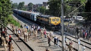 Security on high alert as the first train passes by before resumption of railway services since the train accident, in Amritsar, Sunday, Oct 21, 2018.(PTI) Security on high alert as the first train passes by before resumption of railway services since the train accident, in Amritsar, Sunday, Oct 21, 2018.(PTI)