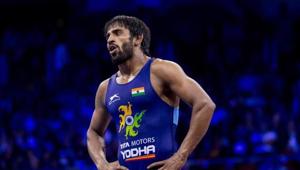 In a close bout, the Indian staved off a late threat from his Cuban rival In a close bout, the Indian staved off a late threat from his Cuban rival
