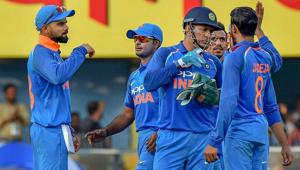 Guwahati: Indian cricket team Captain Virat Kohli celebrates with teammates during the first One Day International cricket match against West Indies, at ACA Cricket Stadium, Barsapara in Guwahati(PTI)