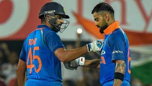 Virat Kohli (right) celebrates his century with Rohit Sharma on Sunday.(PTI) Virat Kohli (right) celebrates his century with Rohit Sharma on Sunday.(PTI)