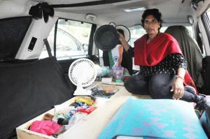 Sangeetha has transformed the SUV she’s travelling in into her mini home.(Dheeraj Dhawan/HT Photo) Sangeetha has transformed the SUV she’s travelling in into her mini home.(Dheeraj Dhawan/HT Photo)
