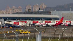 Aircraft stand at the Mumbai International Airport as the runway remained closed for maintenance activities, in Mumbai on October 23.(PTI Photo) Aircraft stand at the Mumbai International Airport as the runway remained closed for maintenance activities, in Mumbai on October 23.(PTI Photo)