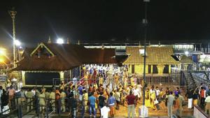 Devotees pay obeisance Lord Ayyappa temple in Sabarimala. Kerala has been witnessing massive protests by devotees of Lord Ayyappa opposing the entry of girls and women of menstrual age into the Sabarimala temple after the government decided to implement the apex court order.(PTI) Devotees pay obeisance Lord Ayyappa temple in Sabarimala. Kerala has been witnessing massive protests by devotees of Lord Ayyappa opposing the entry of girls and women of menstrual age into the Sabarimala temple after the government decided to implement the apex court order.(PTI)