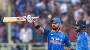 Virat Kohli raises his bat after completing 10,000 ODI runs during the second ODI match against West Indies.(PTI) Virat Kohli raises his bat after completing 10,000 ODI runs during the second ODI match against West Indies.(PTI)