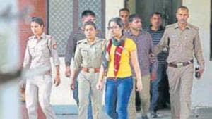 Sonia Dhawan and the other accused in the case of alleged extortion from the Paytm founder being led away at a court on Tuesday.(Sunil Ghosh/Ht photo) Sonia Dhawan and the other accused in the case of alleged extortion from the Paytm founder being led away at a court on Tuesday.(Sunil Ghosh/Ht photo)