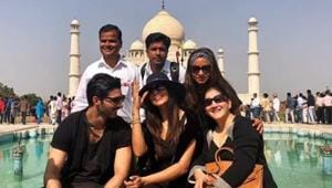 Sushmita Sen poses in front of the Taj Mahal with her team and rumoured boyfriend Rohman Shawl.