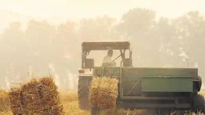 A baler is a machine used to compress crop residue into compact bales.(HT file) A baler is a machine used to compress crop residue into compact bales.(HT file)