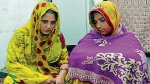 Sisters Aruna Devi and Sita Devi lost their husbands, Girender Kumar and Pawan Kumar, respectively, who were also real brothers, in the train tragedy.(HT Photo)
