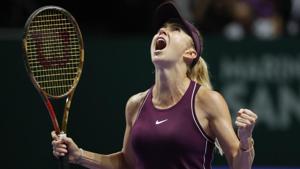 Elina Svitolina of the Ukraine celebrates after winning against Kiki Bertens of the Netherlands in Singapore.(AP) Elina Svitolina of the Ukraine celebrates after winning against Kiki Bertens of the Netherlands in Singapore.(AP)