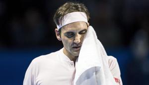 Roger Federer of Switzerland reacts during the quarter-final match against Gilles Simon of France at the Swiss Indoors tennis tournament(AP) Roger Federer of Switzerland reacts during the quarter-final match against Gilles Simon of France at the Swiss Indoors tennis tournament(AP)