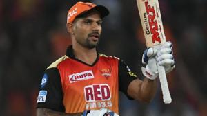 Shikhar Dhawan raises his bat after scoring a half century in the IPL.(AFP) Shikhar Dhawan raises his bat after scoring a half century in the IPL.(AFP)