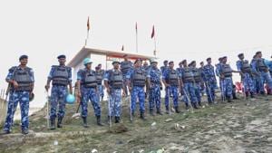 RAF personnel stand guard during Antarrashtria Hindu Parishad president Pravin Togadia's rally near the 'samadhi' of Ram Chandra Paramhans, in Ayodhya.(PTI Photo) RAF personnel stand guard during Antarrashtria Hindu Parishad president Pravin Togadia's rally near the 'samadhi' of Ram Chandra Paramhans, in Ayodhya.(PTI Photo)
