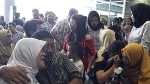 Relatives of passengers comfort each other as they wait for news on a Lion Air plane that crashed off Java Island at Depati Amir Airport in Pangkal Pinang, Indonesia Monday, Oct. 29, 2018. Indonesia disaster agency says that the Lion Air Boeing 737-800 plane crashed into sea shortly after it left Indonesia's capital Monday morning. (AP Photo)(AP) Relatives of passengers comfort each other as they wait for news on a Lion Air plane that crashed off Java Island at Depati Amir Airport in Pangkal Pinang, Indonesia Monday, Oct. 29, 2018. Indonesia disaster agency says that the Lion Air Boeing 737-800 plane crashed into sea shortly after it left Indonesia's capital Monday morning. (AP Photo)(AP)