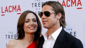 Brad Pitt and actor Angelina Jolie pose at the premiere of The Tree of Life at LACMA in Los Angeles.(REUTERS) Brad Pitt and actor Angelina Jolie pose at the premiere of The Tree of Life at LACMA in Los Angeles.(REUTERS)