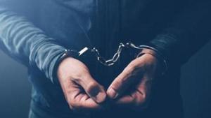 Arrested computer hacker and cyber criminal with handcuffs, close up of hands(Getty Images/iStockphoto) Arrested computer hacker and cyber criminal with handcuffs, close up of hands(Getty Images/iStockphoto)