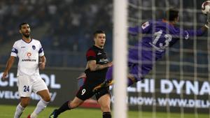 Delhi Dynamos FC's goalkeeper Francisco Dorronsoro saves a goal hit by NorthEast United FC's Federico Gallego, centre, during Hero Indian Super League soccer match between Delhi Dynamos FC and NorthEast United FC in New Delhi, India, Tuesday, Oct. 30, 2018. (AP Photo/Altaf Qadri)(AP) Delhi Dynamos FC's goalkeeper Francisco Dorronsoro saves a goal hit by NorthEast United FC's Federico Gallego, centre, during Hero Indian Super League soccer match between Delhi Dynamos FC and NorthEast United FC in New Delhi, India, Tuesday, Oct. 30, 2018. (AP Photo/Altaf Qadri)(AP)