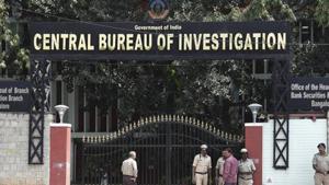 Security personnel stand guard outside the CBI headquarters in Bengaluru.(AP Photo) Security personnel stand guard outside the CBI headquarters in Bengaluru.(AP Photo)