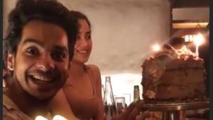 In an Instagram story shared by Mira Rajput, Ishaan Khatter is ecstatic to see his birthday cake. Seated next to him is Janhvi Kapoor.(Instagram) In an Instagram story shared by Mira Rajput, Ishaan Khatter is ecstatic to see his birthday cake. Seated next to him is Janhvi Kapoor.(Instagram)