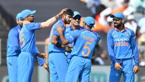 India bowler Khaleel Ahmed (C) celebrates with captain Virat Kohli (R), Mahendra Singh Dhoni and Shikhar Dhawan (L) after taking the wicket of West Indies cricketer Marlon Samuels(AFP) India bowler Khaleel Ahmed (C) celebrates with captain Virat Kohli (R), Mahendra Singh Dhoni and Shikhar Dhawan (L) after taking the wicket of West Indies cricketer Marlon Samuels(AFP)