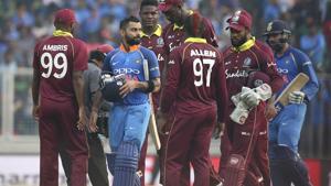 India's captain Virat Kohli, second left, and teammate Rohit Sharma, right, leave the field with by West Indies' players after their win in the fifth and last one-day international cricket match in Thiruvananthapuram(AP) India's captain Virat Kohli, second left, and teammate Rohit Sharma, right, leave the field with by West Indies' players after their win in the fifth and last one-day international cricket match in Thiruvananthapuram(AP)