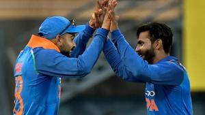 Guwahati: Indian cricket team Captain Virat Kohli celebrates with teammate Ravindra Jadeja during the first One Day International cricket match against West Indies.(PTI)