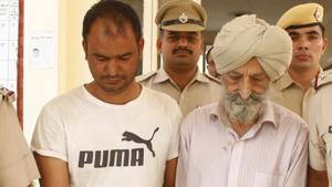 Prime accused Harnek Singh Dhillon (right) was arrested on October 24 after he allegedly confessed to killing his wife,to cover up the murder of a flour mill owner. His aide, Jagdish Kumar (in t-shirt) will be taken to Punjab by Gurugram police to locate the missing body parts of the mill owner.(Yogendra Kumar/HT PHOTO) Prime accused Harnek Singh Dhillon (right) was arrested on October 24 after he allegedly confessed to killing his wife,to cover up the murder of a flour mill owner. His aide, Jagdish Kumar (in t-shirt) will be taken to Punjab by Gurugram police to locate the missing body parts of the mill owner.(Yogendra Kumar/HT PHOTO)