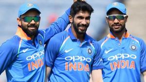 India bowler Jasprit Bumrah (C) celebrates with captain Virat Kohli (L) and Shikhar Dhawan after taking the wicket of West Indies cricketer Kieran Powell during an ODI.(AFP) India bowler Jasprit Bumrah (C) celebrates with captain Virat Kohli (L) and Shikhar Dhawan after taking the wicket of West Indies cricketer Kieran Powell during an ODI.(AFP)