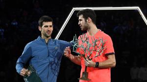 Winner Russia's Karen Khachanov (R) and second placed Serbia's Novak Djokovic pose with their trophies.(AFP) Winner Russia's Karen Khachanov (R) and second placed Serbia's Novak Djokovic pose with their trophies.(AFP)