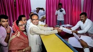 Sehore: Madhya Pradesh Chief Minister and BJP candidate Shivraj Singh Chouhan files his nomination paper in view of upcoming Assembly Elections, from Budhni, Sehore district, Monday, Nov 05, 2018. Shivraj's wife Sadhna and sons Kunal and Kartikey are also seen. (PTI Photo)(PTI) Sehore: Madhya Pradesh Chief Minister and BJP candidate Shivraj Singh Chouhan files his nomination paper in view of upcoming Assembly Elections, from Budhni, Sehore district, Monday, Nov 05, 2018. Shivraj's wife Sadhna and sons Kunal and Kartikey are also seen. (PTI Photo)(PTI)