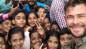 Chris Hemsworth poses with kids in Ahmedabad, where he is filming Netflix’s Dhaka. Chris Hemsworth poses with kids in Ahmedabad, where he is filming Netflix’s Dhaka.