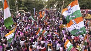 Congress workers celebrate after the party’s win in Jamakhandi assembly bypoll, on Tuesday.(PTI Photo)