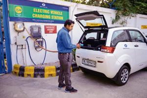 An electric vehicle charging station. The cost of buying vehicles and setting up support infrastructure is prohibitive– the global estimate by Goldman Sachs is six trillion dollar for infrastructure(Pradeep Gaur/ Mint) An electric vehicle charging station. The cost of buying vehicles and setting up support infrastructure is prohibitive– the global estimate by Goldman Sachs is six trillion dollar for infrastructure(Pradeep Gaur/ Mint)
