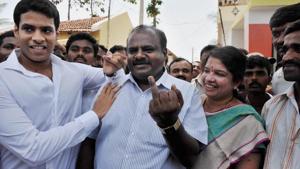 JD(S) state president H D Kumaraswamy, wife and Ramanagara MLA, Anita Kumaraswamy and son Nikhil in Ramanagara in Karnataka.(PTI) JD(S) state president H D Kumaraswamy, wife and Ramanagara MLA, Anita Kumaraswamy and son Nikhil in Ramanagara in Karnataka.(PTI)