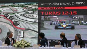 President and CEO of Formula 1 Chase Carey, left, Hanoi Mayor Nguyen Duc Chung, second from left and two other officials watch the Hanoi F1 circuit design on the screen in Hanoi, Vietnam.(AP) President and CEO of Formula 1 Chase Carey, left, Hanoi Mayor Nguyen Duc Chung, second from left and two other officials watch the Hanoi F1 circuit design on the screen in Hanoi, Vietnam.(AP)
