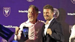 Jorge Mas (left) and David Beckham celebrate in Coral Gables after Miami voters gave city officials permission to negotiate a no-bid lease deal with Beckham's group, which wants to build a Major League Soccer complex on what has been a public golf course.(AP) Jorge Mas (left) and David Beckham celebrate in Coral Gables after Miami voters gave city officials permission to negotiate a no-bid lease deal with Beckham's group, which wants to build a Major League Soccer complex on what has been a public golf course.(AP)