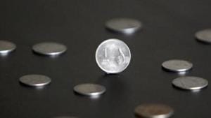 A candidate from Indore-3 assembly seat in poll-bound Madhya Pradesh Thursday brought Rs 10,000 in one-rupee coins as security deposit to accompany his nomination papers.(Reuters File Photo) A candidate from Indore-3 assembly seat in poll-bound Madhya Pradesh Thursday brought Rs 10,000 in one-rupee coins as security deposit to accompany his nomination papers.(Reuters File Photo)