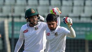Bangladesh cricketer Mominul Haque (R) celebrates his century with teammate Mushfiqur Rahim (L) during the first day of the second Test cricket match between Bangladesh and Zimbabwe at the Sher-e-Bangla National Cricket Stadium in Dhaka(AFP) Bangladesh cricketer Mominul Haque (R) celebrates his century with teammate Mushfiqur Rahim (L) during the first day of the second Test cricket match between Bangladesh and Zimbabwe at the Sher-e-Bangla National Cricket Stadium in Dhaka(AFP)