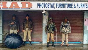 Security personnel stand guard during curfew after a senior BJP leader Anil Parihar (52) and his brother Ajeet (55) were killed by suspected militants in Kishtwar, Jammu.(PTI) Security personnel stand guard during curfew after a senior BJP leader Anil Parihar (52) and his brother Ajeet (55) were killed by suspected militants in Kishtwar, Jammu.(PTI)