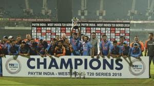 Members of the Indian cricket team pose with the winners trophy after their win in the third and last Twenty20 international cricket match against West Indies in Chennai.(AP)
